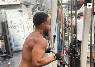 Marcel training on a cable machine.